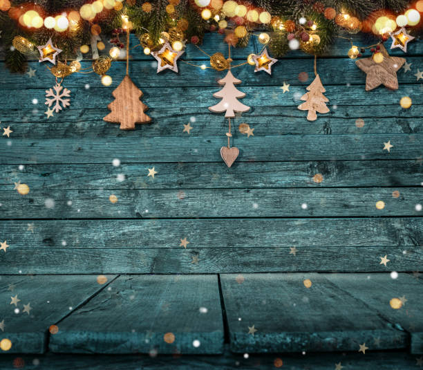 istock Christmas decoration on wooden background 1073993264