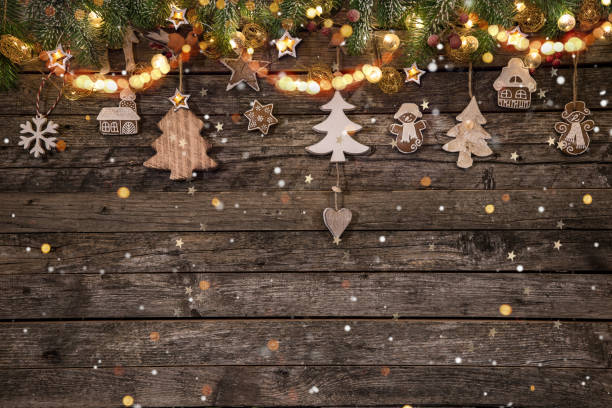 istock Christmas decoration on wooden background 1073993282