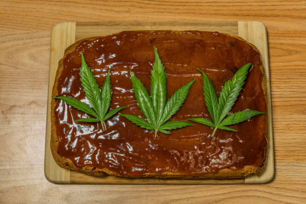 istock Marijuana gingerbread with orange briar marmalade and fresh green leafs 1073996076