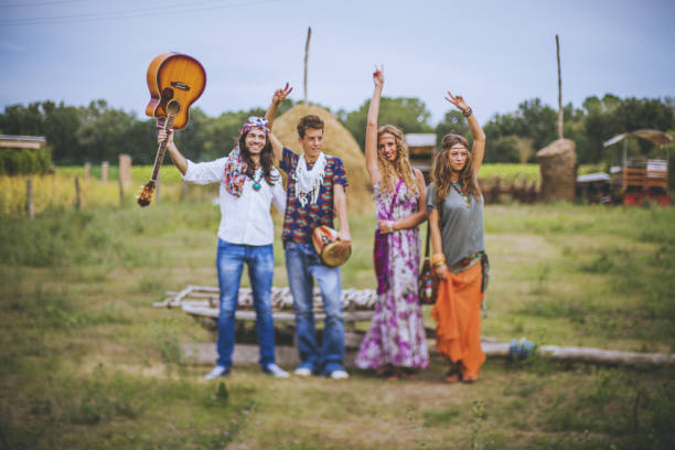 istock Hippies: old fashioned group of friends 1073997362