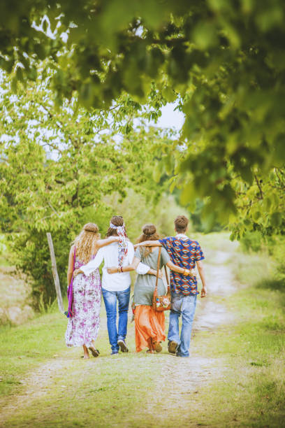 istock Hippies: old fashioned group of friends 1073997364