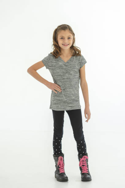istock Young caucasian girl against a white backdrop 1074010032