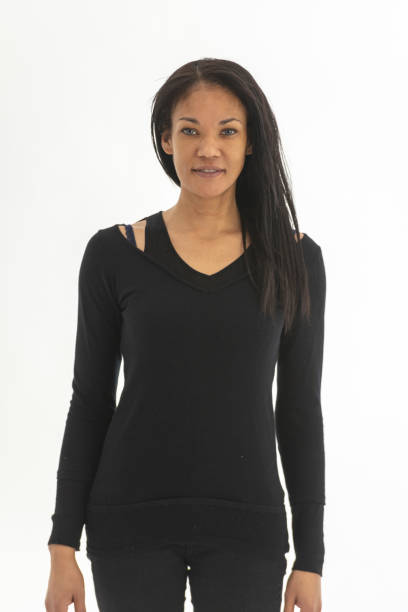 istock Black woman posing against a white backdrop 1074010064