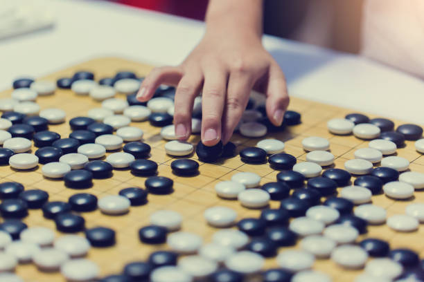 istock Chinese go games with countdown clock for fighting. 1074012720