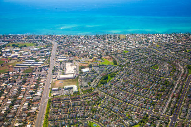 Honolulu district near the airport with private houses Aerial view of the Honolulu district near the airport with private houses, lakes and the sea with ships. business architecture blue people stock pictures, royalty-free photos & images