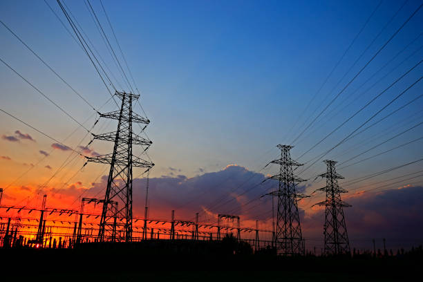 istock Electric tower, silhouette at sunset 1074038916
