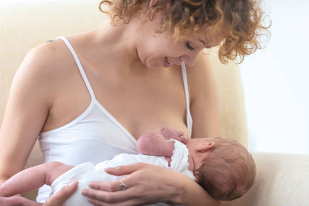 istock Mother breastfeeding her newborn baby 1074041828