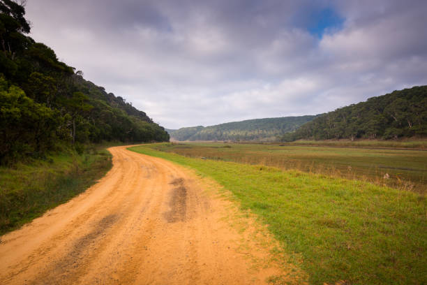 istock Dirt road through the valley 2 1074043586