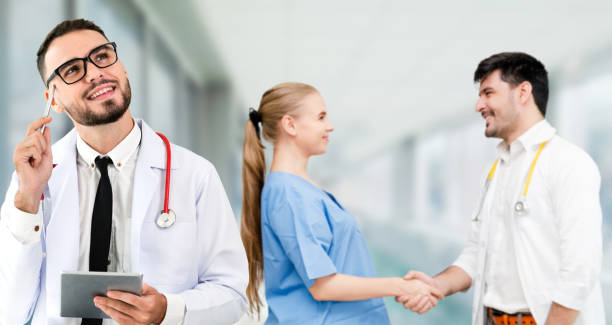 istock Doctor working in hospital with other doctors. 1074046490
