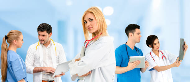 istock Doctor working in hospital with other doctors. 1074047004