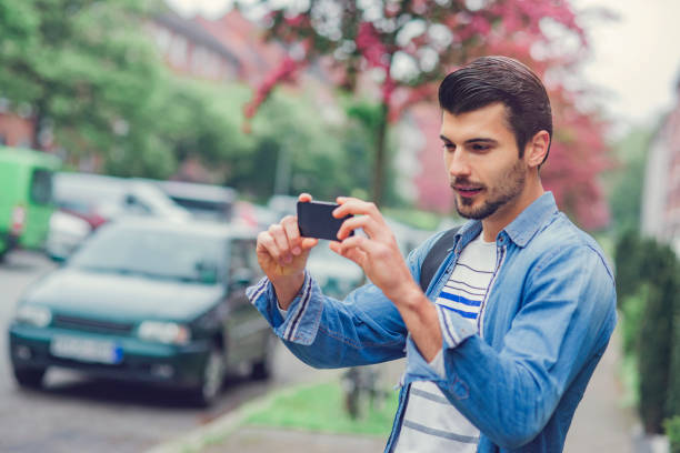 istock casual young man walking to his work 1074047102
