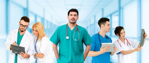 istock Doctor working in hospital with other doctors. 1074047110