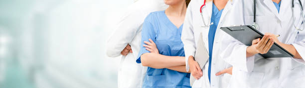 istock Doctor working in hospital with other doctors. 1074049408