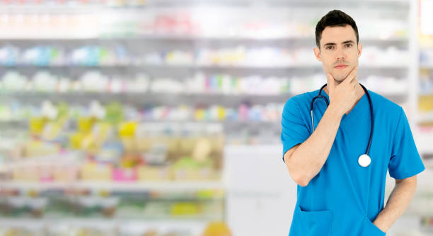 istock Male pharmacist working at the pharmacy. 1074065718