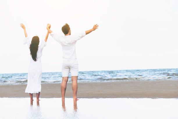 istock Couple going honeymoon on tropical beach in summer 1074072496