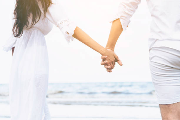istock Couple going honeymoon on tropical beach in summer 1074072500