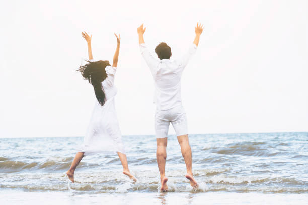 istock Couple going honeymoon on tropical beach in summer 1074072526