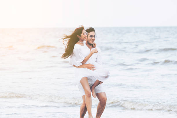 istock Couple going honeymoon on tropical beach in summer 1074072552