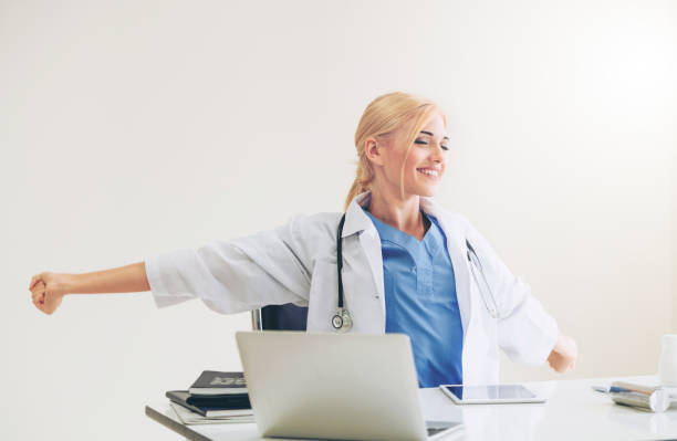 istock Relaxed doctor taking a break in hospital office. 1074076812