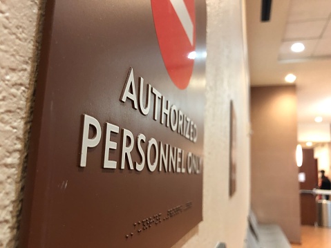 Authorized personnel sign