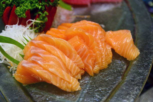 istock Selective focus point Raw fresh Salmon sashimi - japanese food style 1074089758