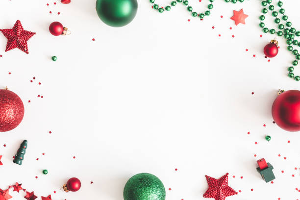 istock Christmas composition. Christmas red and green decorations on white background. Flat lay, top view, copy space 1074092506