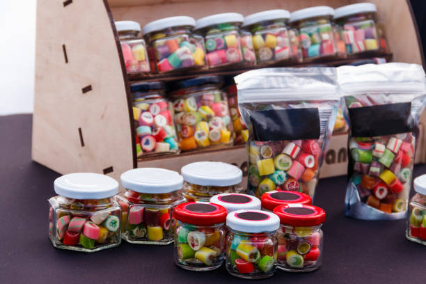 istock Colorful candies in jars on table 1074095594