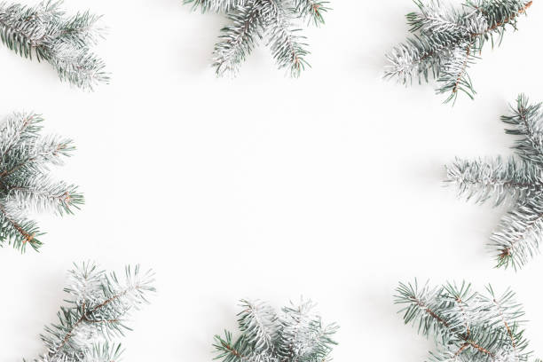 istock Christmas composition. Frame made of fir tree branches on white background. Christmas, winter, new year concept. Flat lay, top view, copy space 1074099556