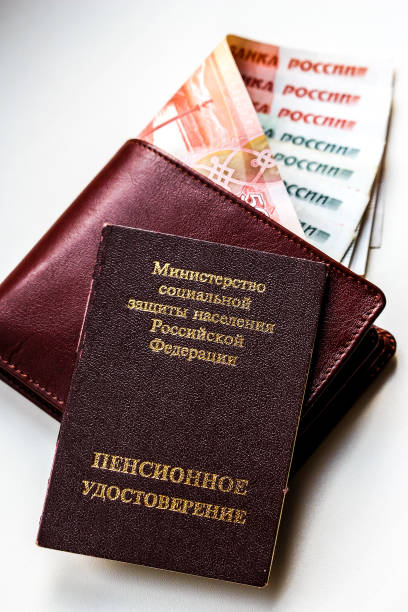 istock Russian pension certificate and wallet with russian rubles. 1074100164