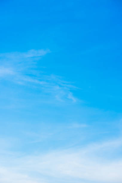 istock Beautiful blue sky with cloud formation background 1074117450