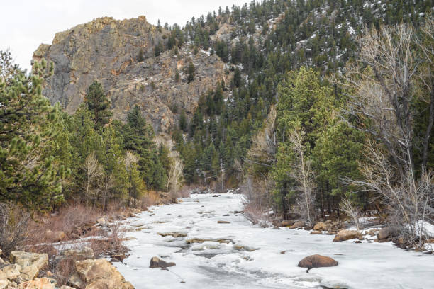 istock Frozen creek in the mountains 1074129828