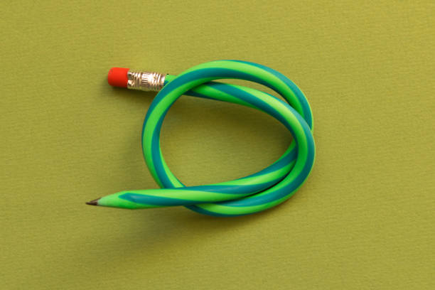 istock Flexible pencil . Isolated on dark green background 1074130558