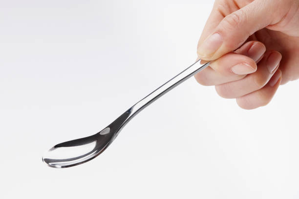 a polished steel spoon