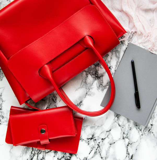 istock red leather bag and accessories 1074133400