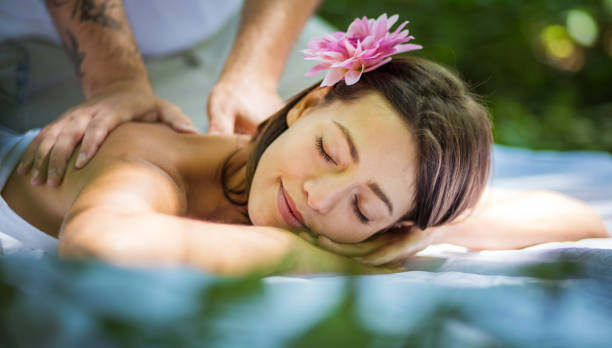 istock His massages give him a smile on his face. 1074141408