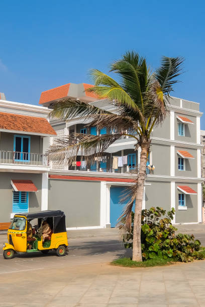 Promenade beach road in Pondicherry. Promenade beach road in Pondicherry, India. auto rickshaw taxi india stock pictures, royalty-free photos & images
