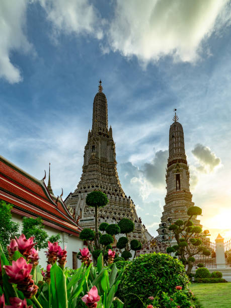 istock Wat Arun Ratchawararam with beautiful blue sky and white clouds. Wat Arun buddhist temple is the landmark in Bangkok, Thailand. Attraction art and ancient architecture in Bangkok, Thailand. 1074143602
