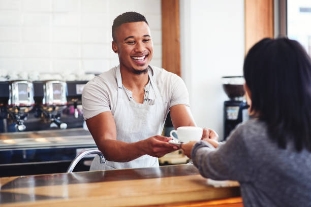 Being a barista allows me to meet new people everyday stock photo