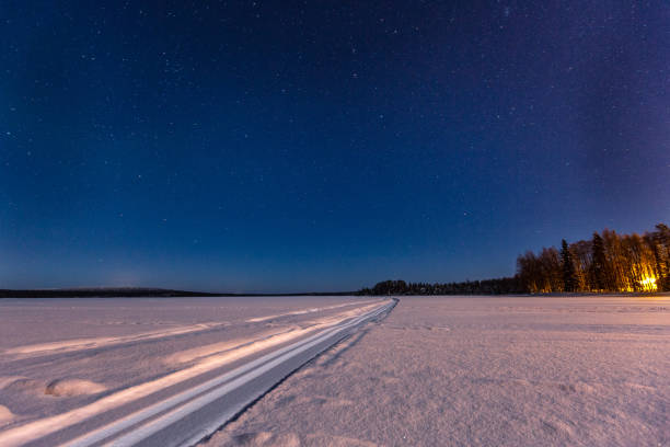 istock ski track under the stars in Lapland, Finland 1074148080
