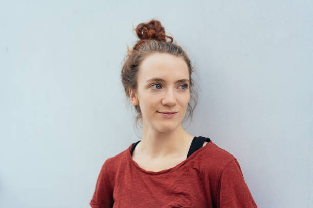 istock Thoughtful young woman looking to the side 1074148088