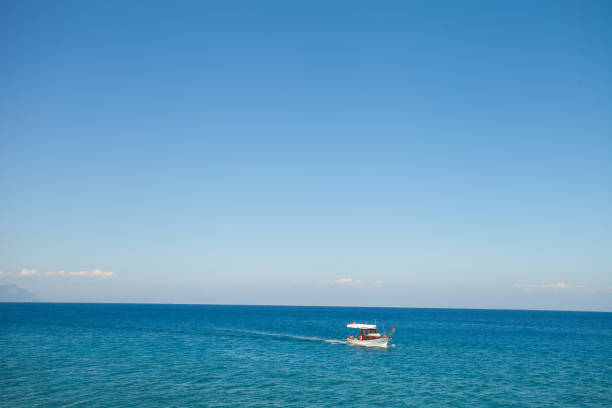 istock a boat in the mediterranean sea 1074148272