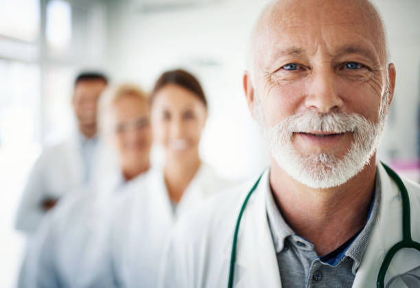 istock Group of doctors looking at the camera. 1074152940