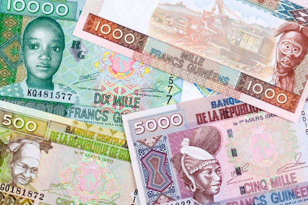 istock Guinean money a background 1074157508
