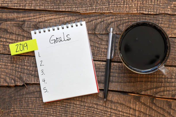 istock Goals 2019 text written in a notebook. High quality photo. 1074160358