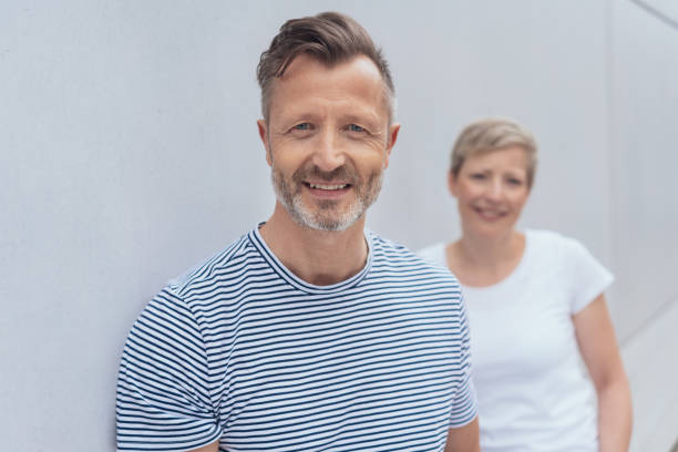 istock Attractive bearded man with a friendly smile 1074164406