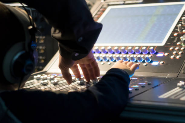 istock Playing music at DJ audio mixer. 1074164924
