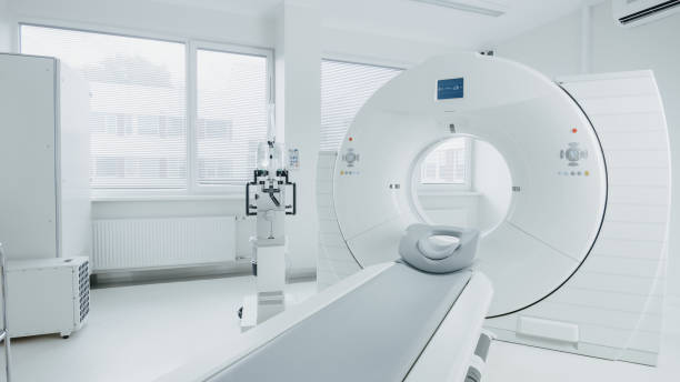 Medical CT or MRI or PET Scan Standing in the Modern Hospital Laboratory. Technologically Advanced and Functional Mediсal Equipment in a Clean White Room. Medical CT or MRI or PET Scan Standing in the Modern Hospital Laboratory. Technologically Advanced and Functional Mediсal Equipment in a Clean White Room. radiotherapy stock pictures, royalty-free photos & images