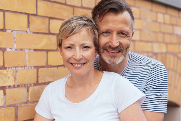 istock Happy friendly middle-aged couple 1074166916