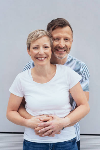 Happy smiling loving middle-aged couple