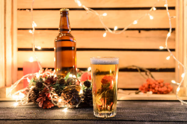 istock Christmas composition with a glass of beer 1074171668